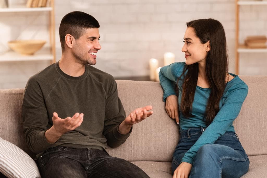 Engaged couple having a discussion debunking the common misconceptions about prenups